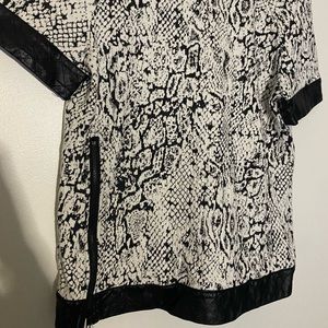 #19 811 by Walter baker faux leather/ snake blouse